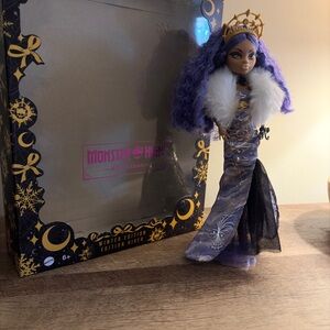 Monster High Holiday Doll with Purple Hair and Gold Crown Clawdeen Wolf
